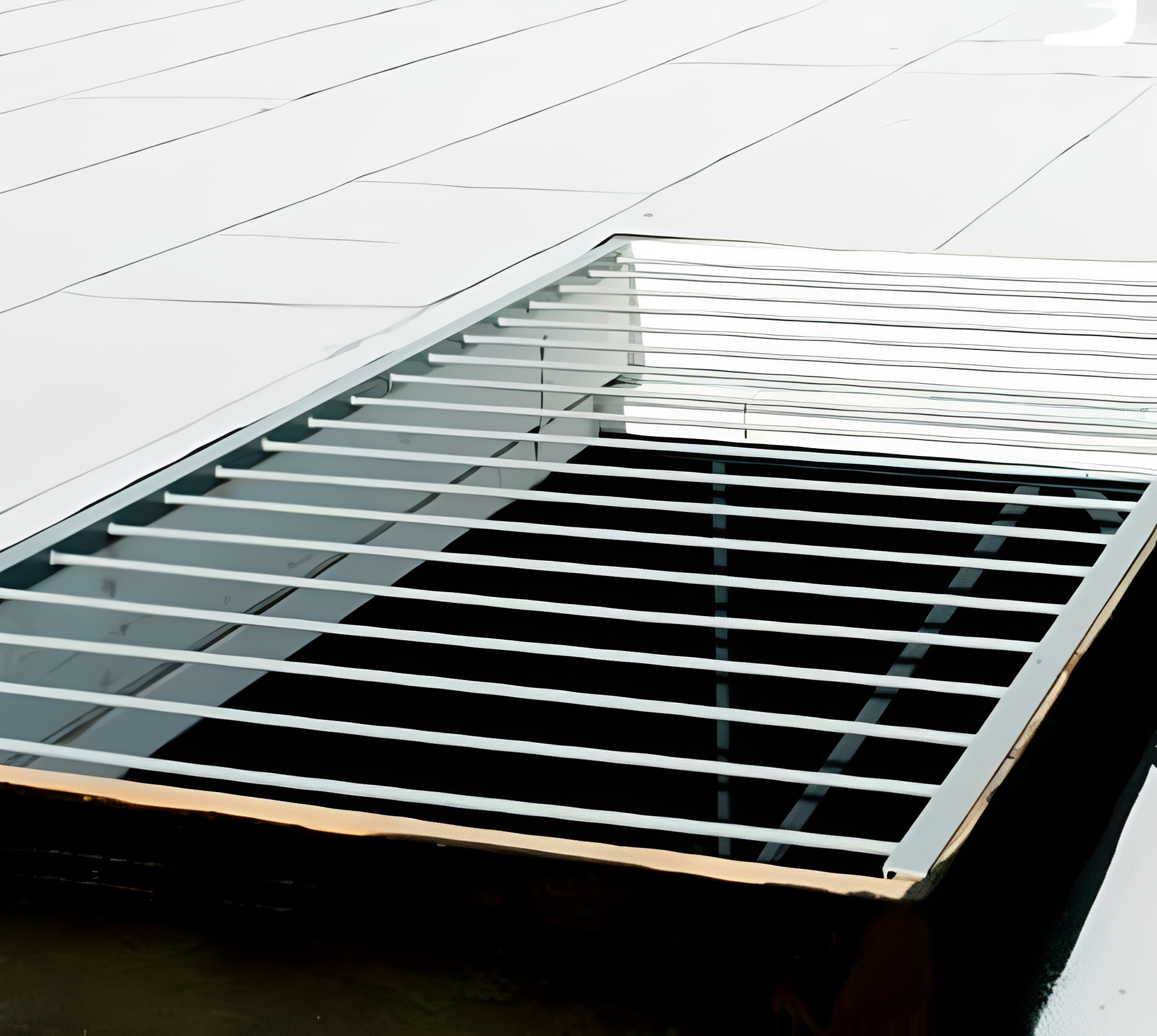 Reflective water with metal grate above.